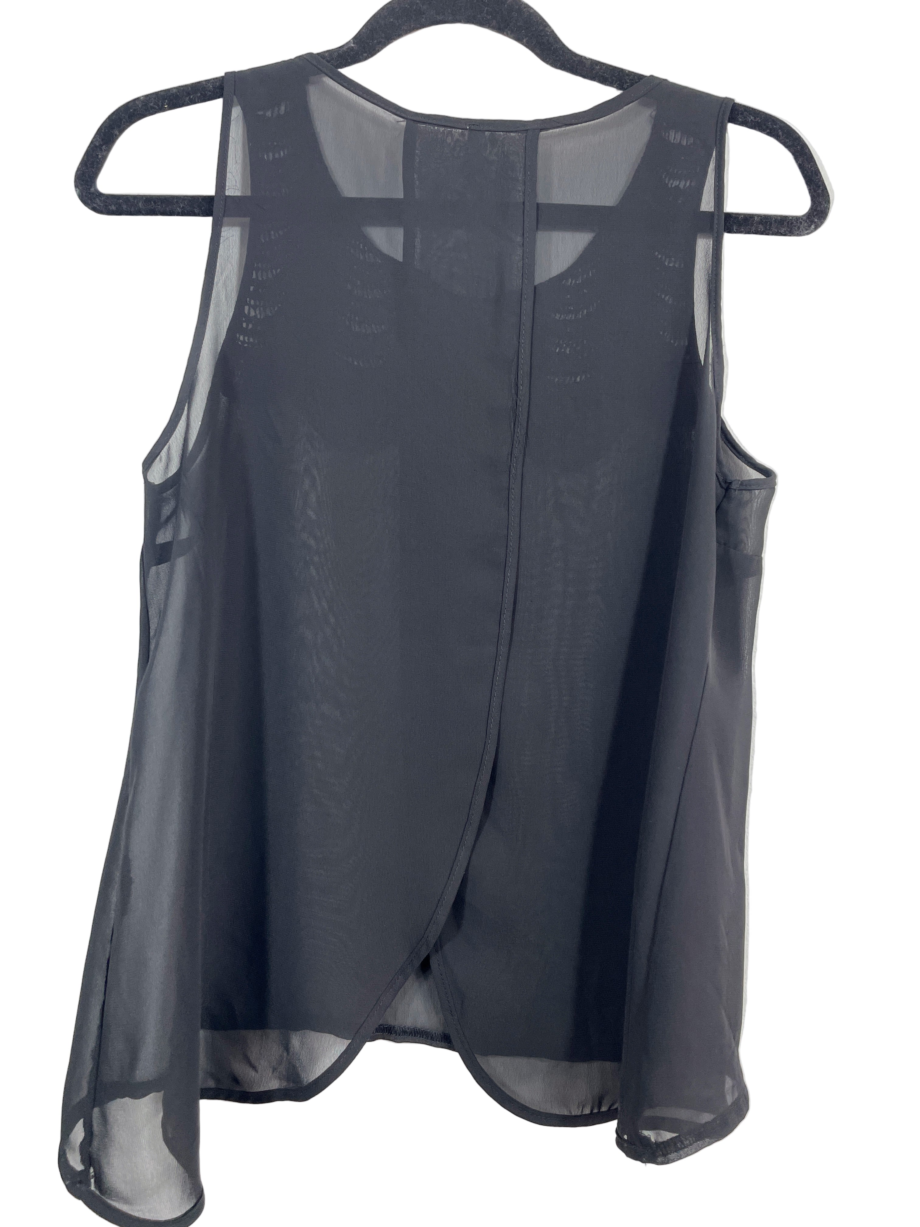 Back view of JO & Co black sheer blouse with tulip hem