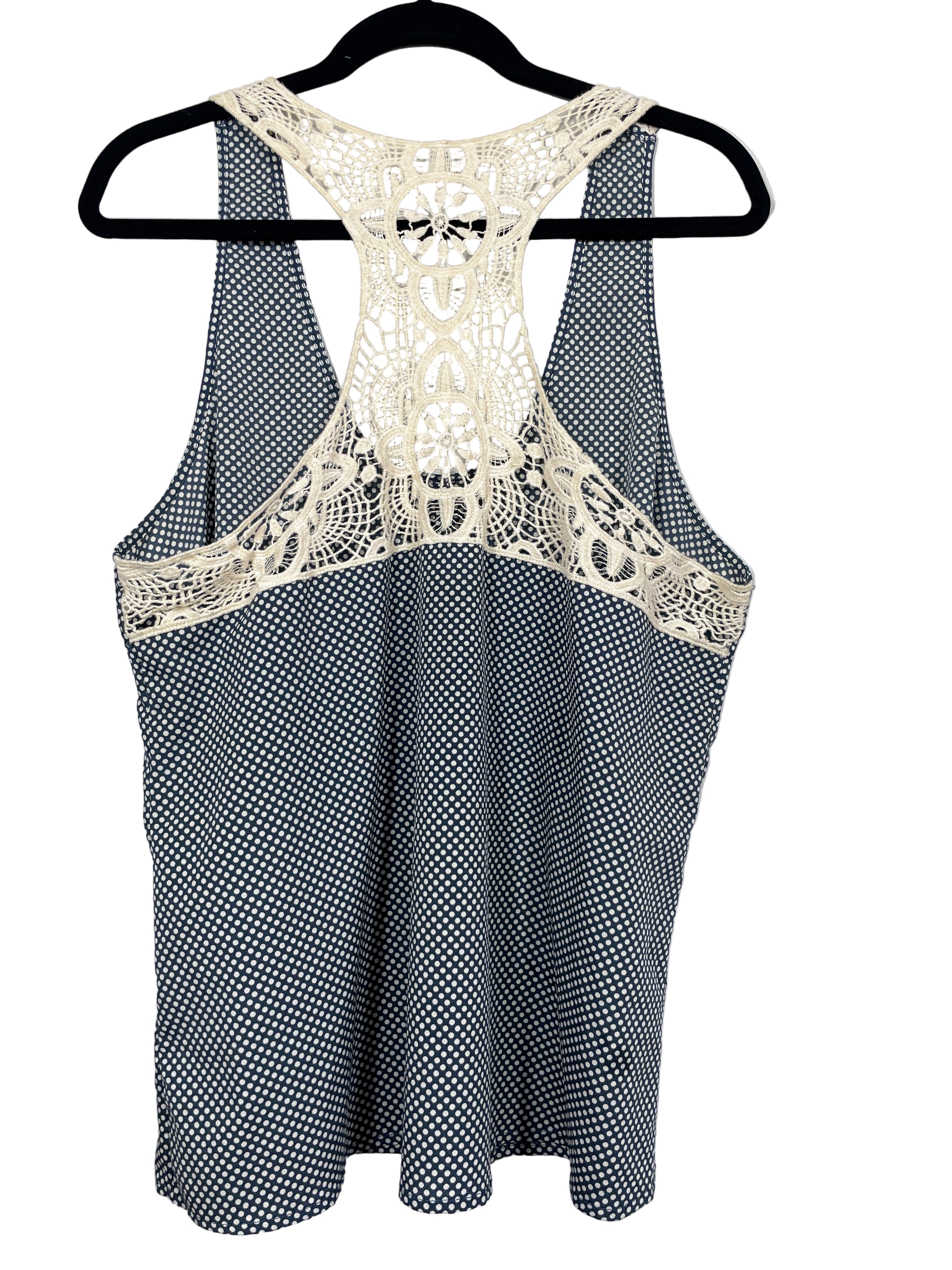 Back view of Kismet polka dot tank top, slate blue with cream polka dots and cream crochet racerback detail