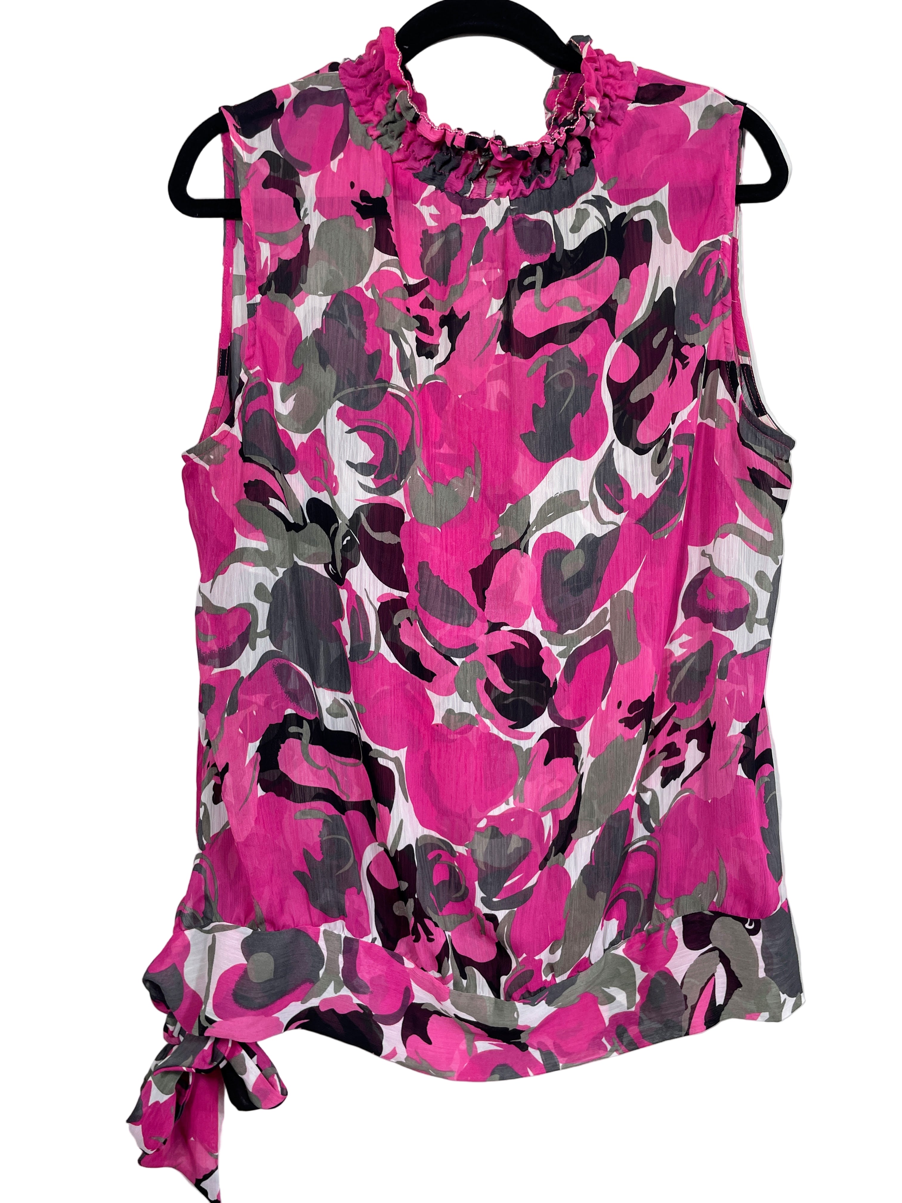 Back view of Revolution by Ricki’s pink floral blouse with tie hem