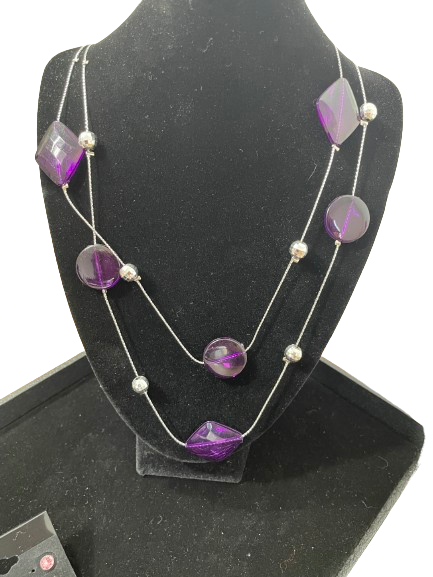 Long layered silver-tone necklace with purple beads