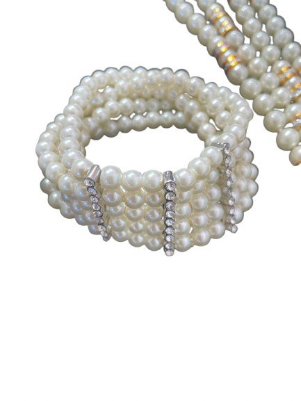 Multi-strand faux pearl bracelet with rhinestone bars