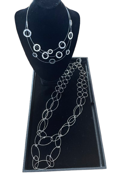 Lot of two silver-tone modern circle necklaces