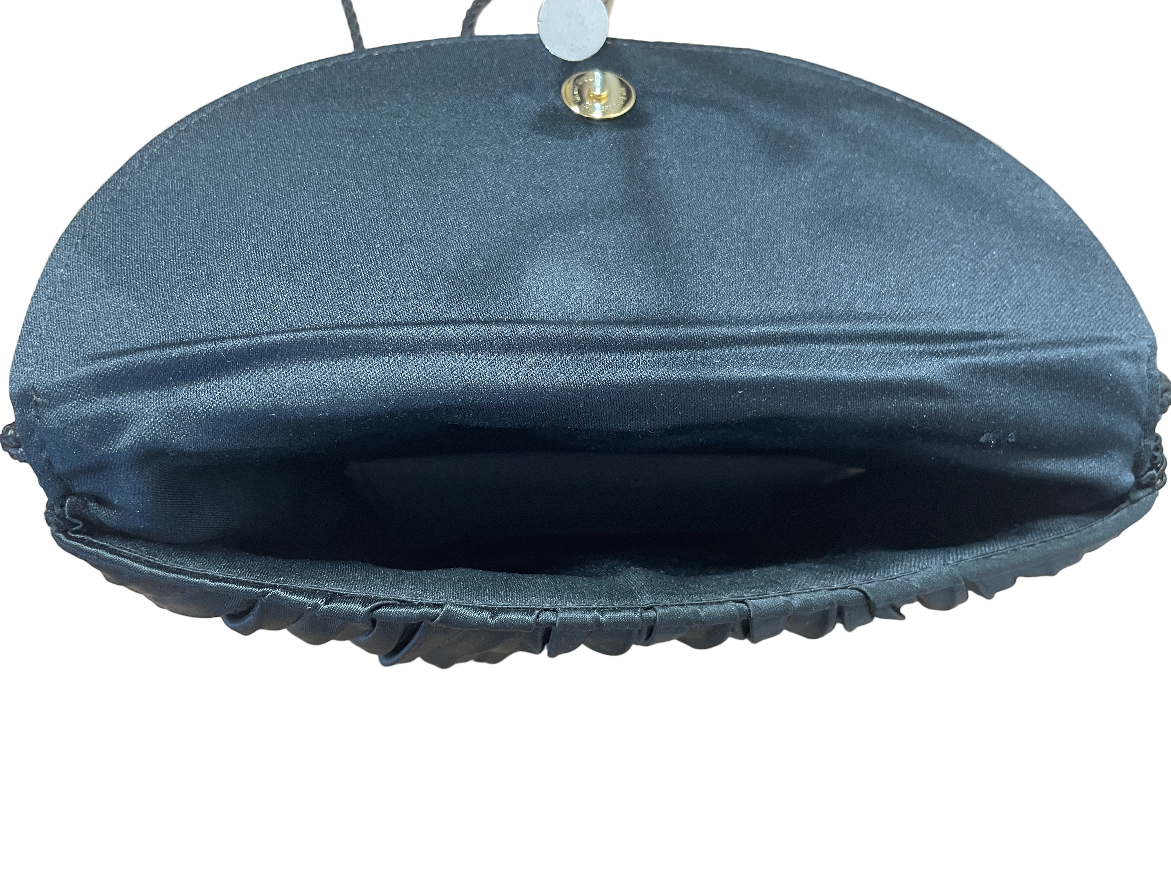 vintage black crossbody purse interior with lining