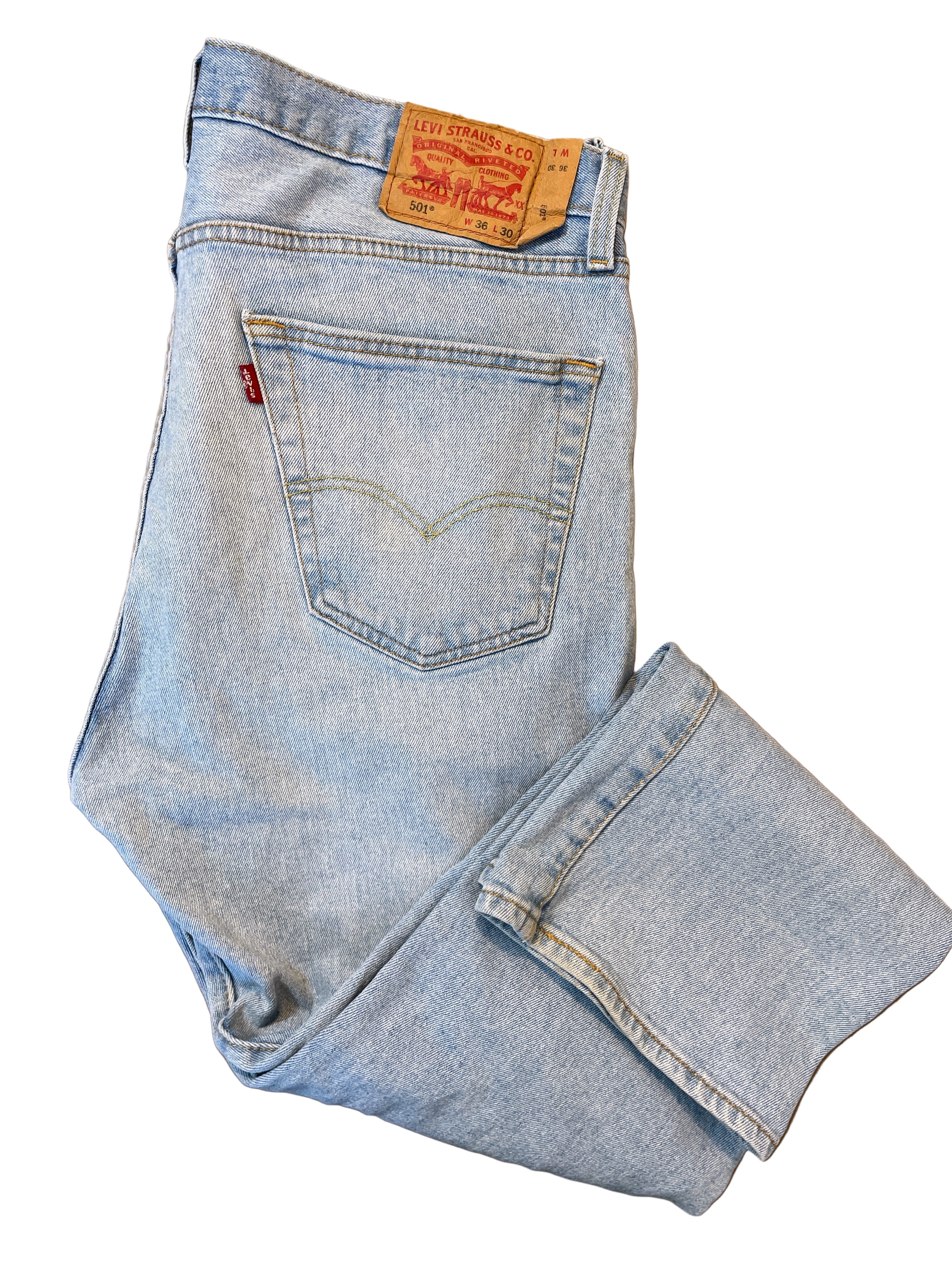 Folded view of Levi’s 501 light wash jeans showing patch and leg