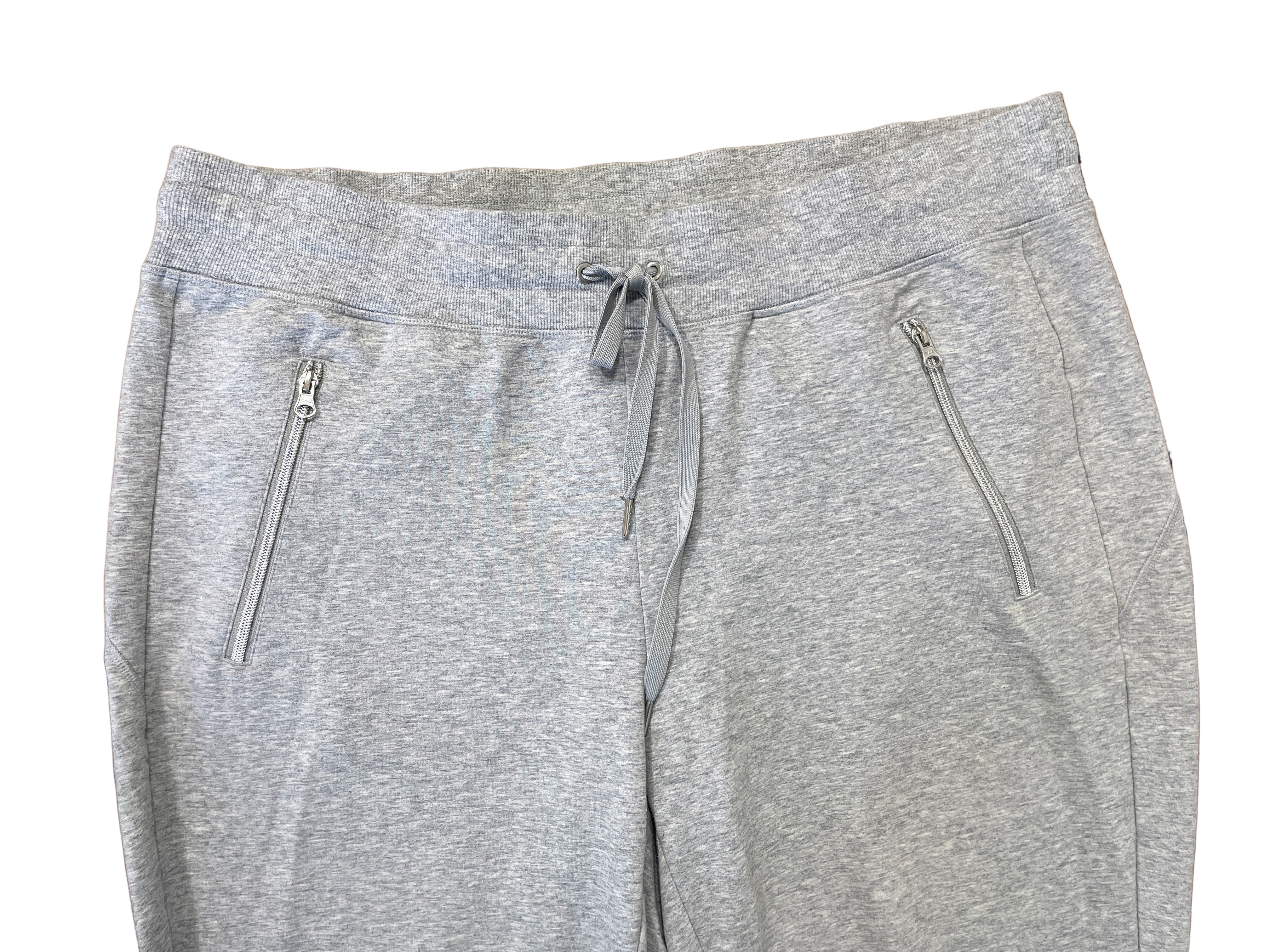 Front view of ActiveZone grey sweatpants with drawstring and zippered pockets