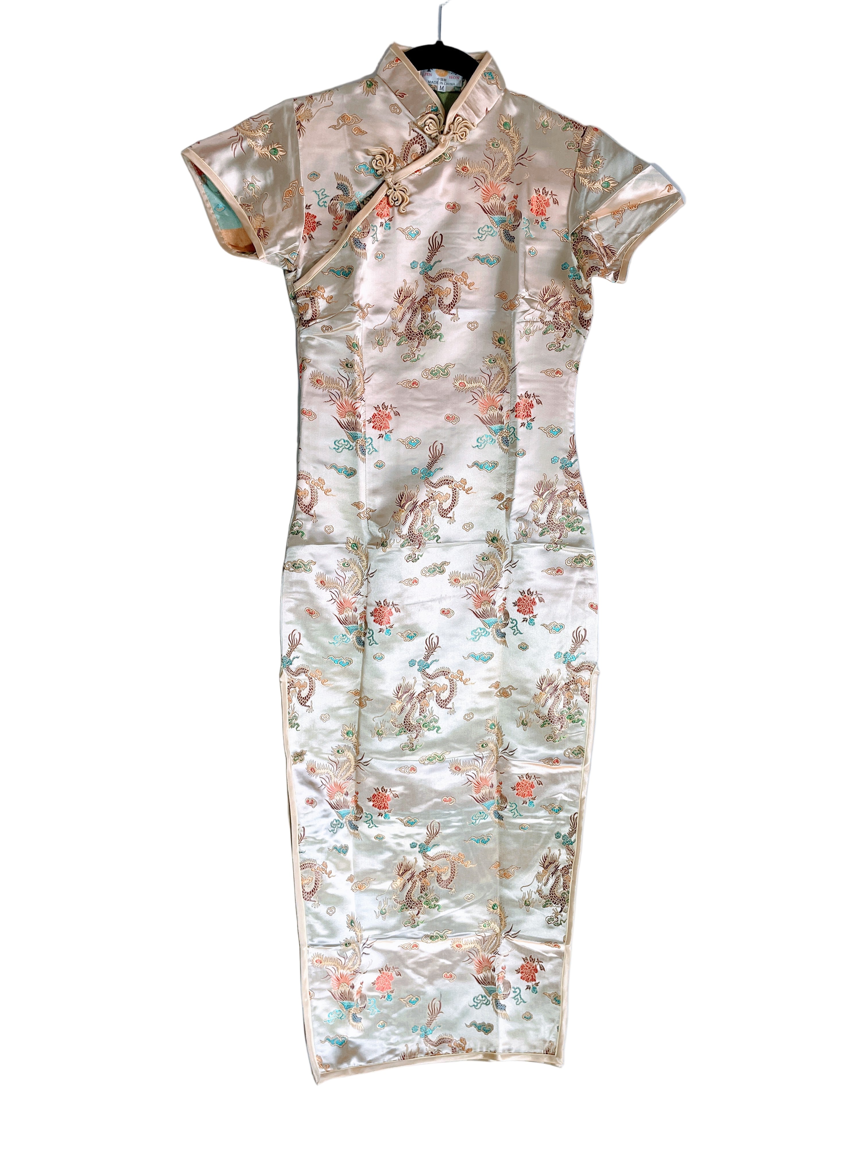 Front view of Jin Hon beige embroidered traditional Chinese dress with dragon design