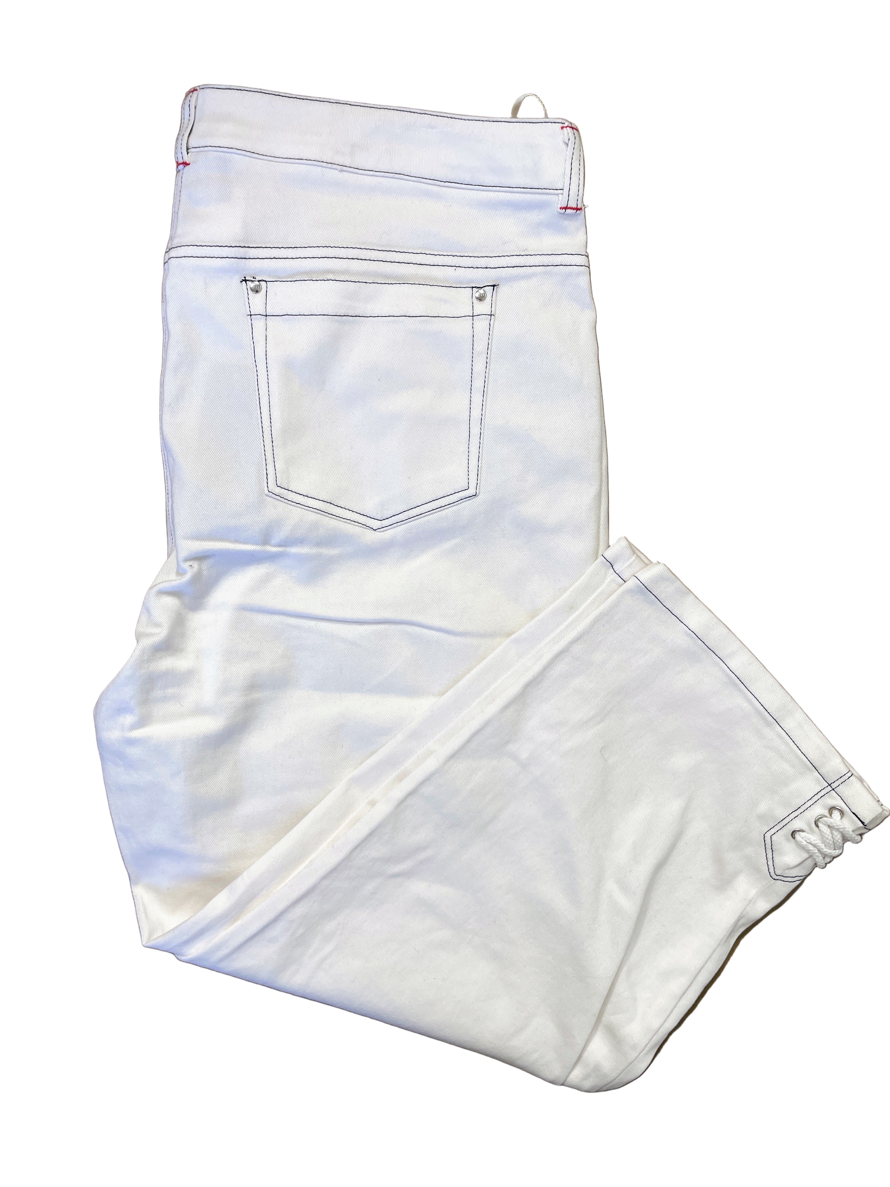 Folded view of Jones New York white ankle jeans with rope detail at hem