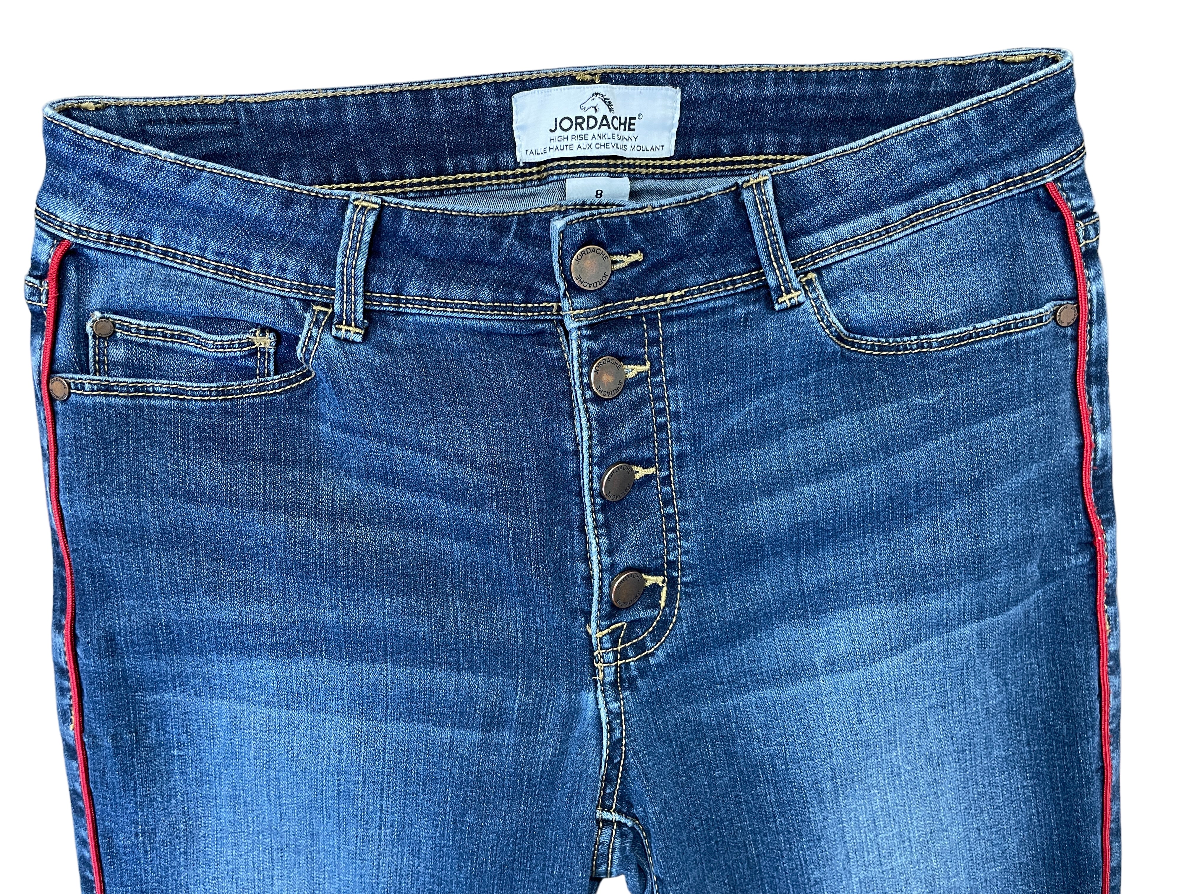 Front view of Jordache ankle skinny jeans showing button fly and piping detail
