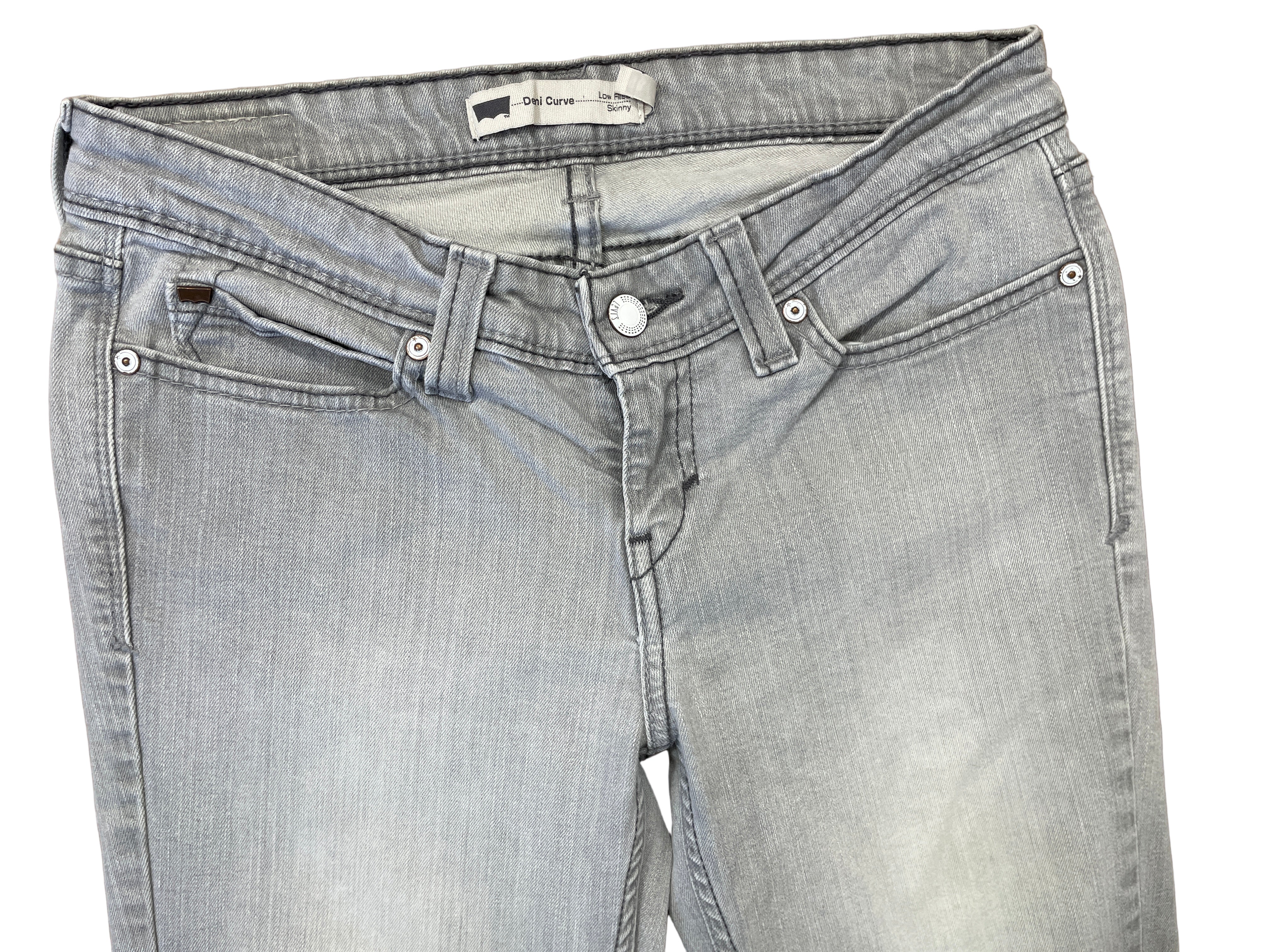 Front view of Levi’s Demi Curve low rise skinny jeans with button and zipper closure