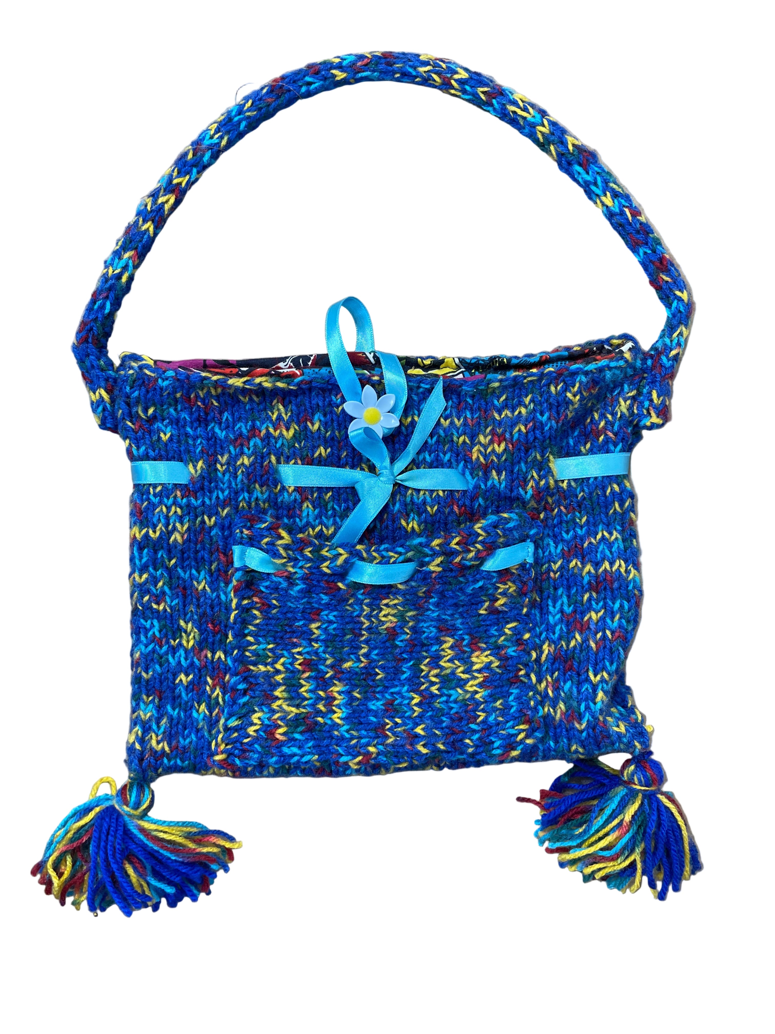 Handmade knit purse with multicoloured yarn and blue ribbon accents