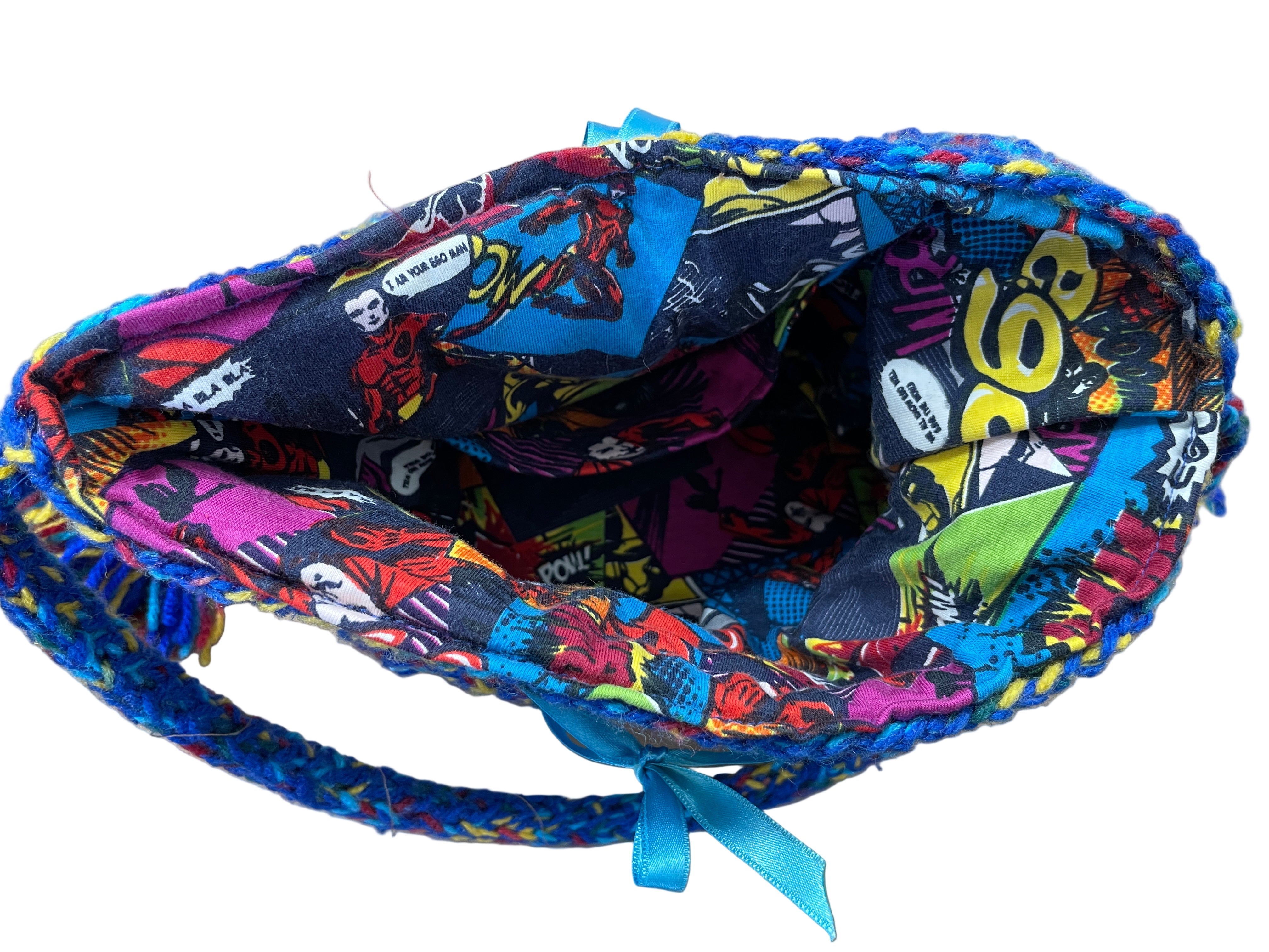 Inside view of handmade purse with bright comic book print lining