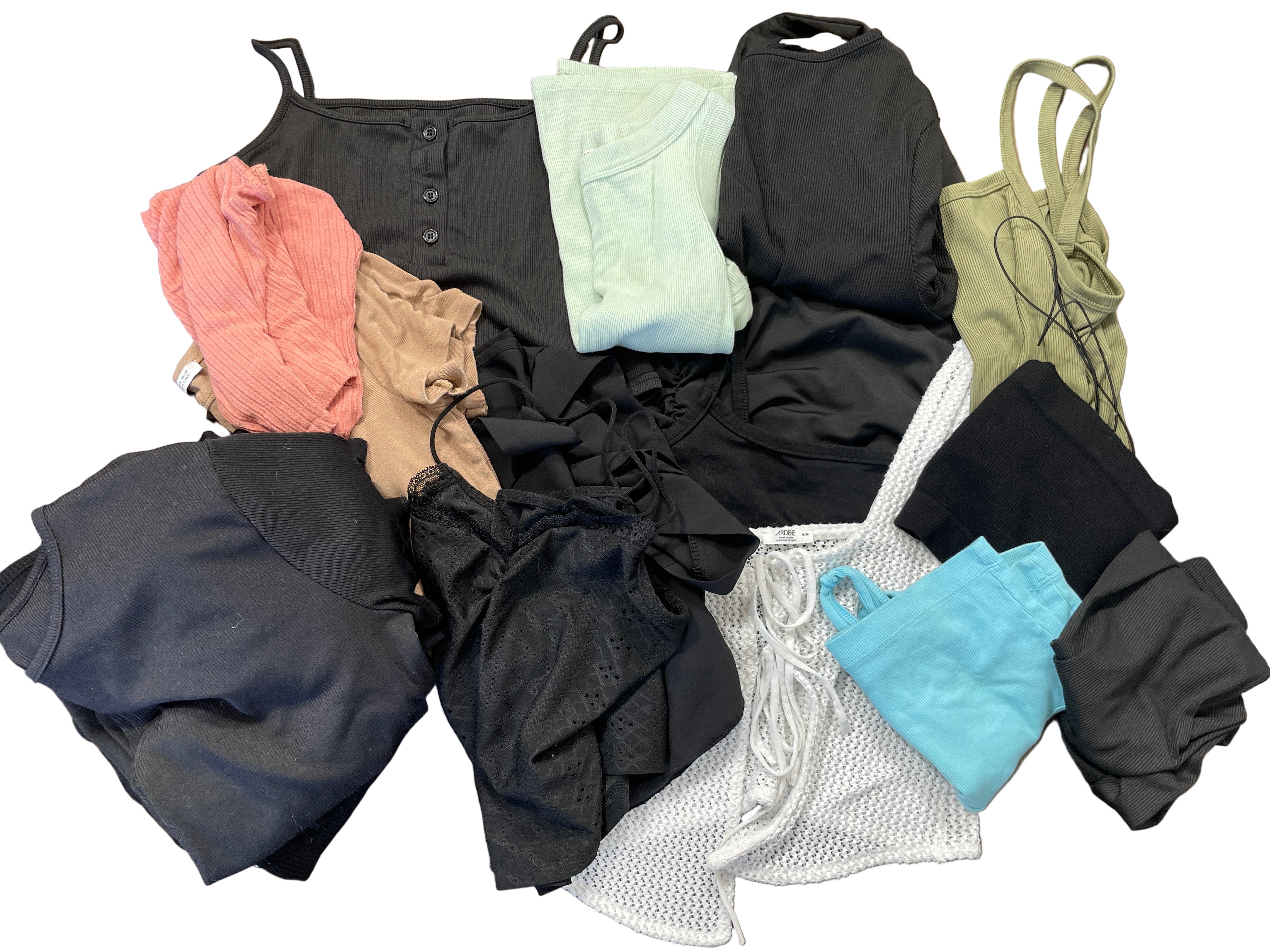 Flat lay showing 20 assorted women’s medium tops in a variety of colours and styles including tank tops, t-shirts, blouses, and one long sleeve from brands such as Zara, H&M, SHEIN, and Ardene.