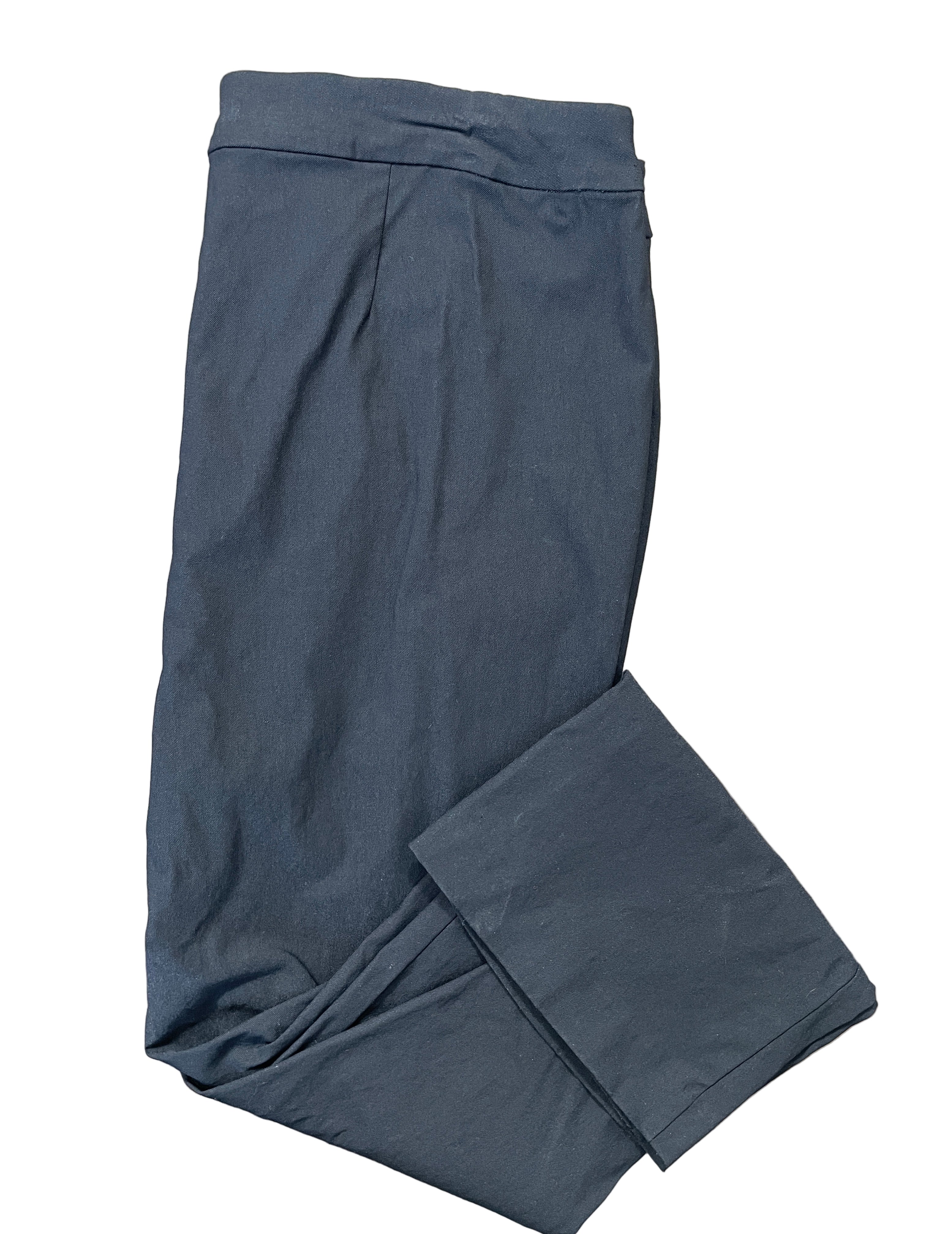 Michel Studio Collection black wide-leg stretch pants folded neatly showing waistband and leg.
