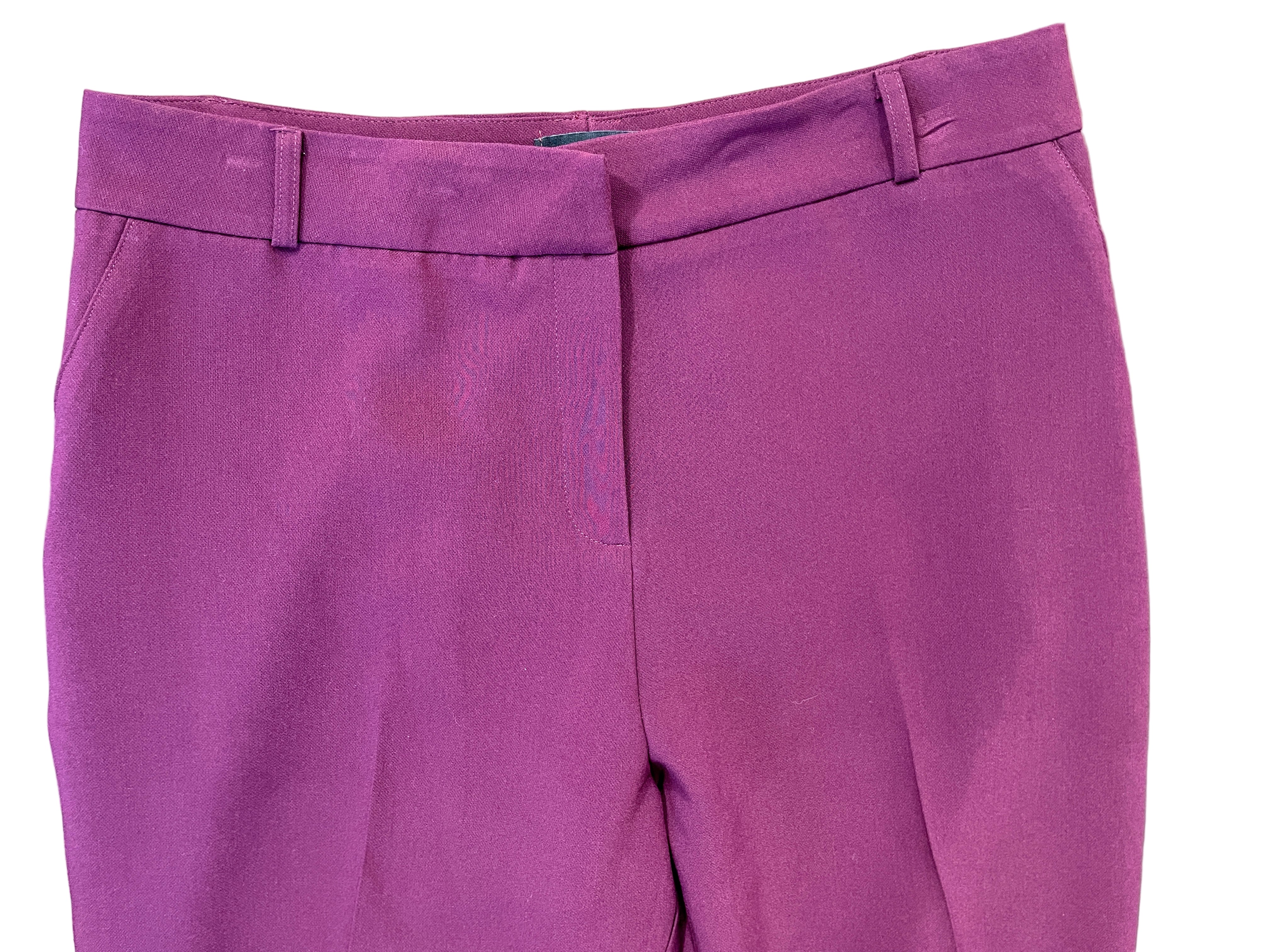 Front view of Le Château burgundy dress pants with zipper fly and belt loops.
