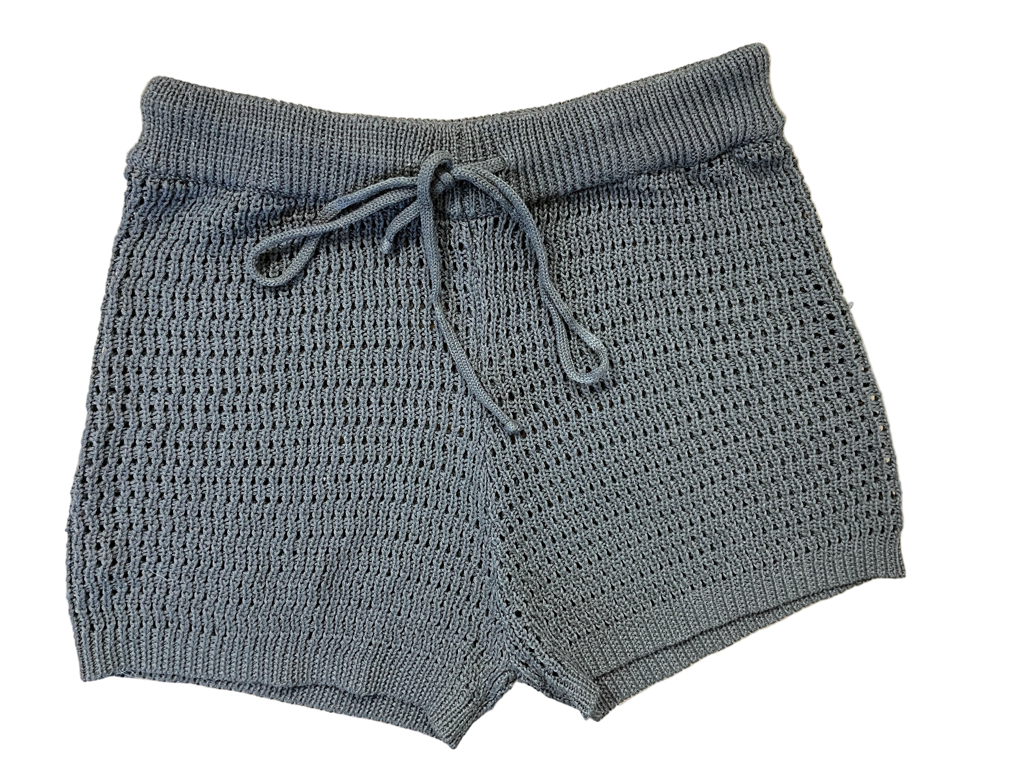 Front view of black SHEIN crochet knit shorts with drawstring waistband.