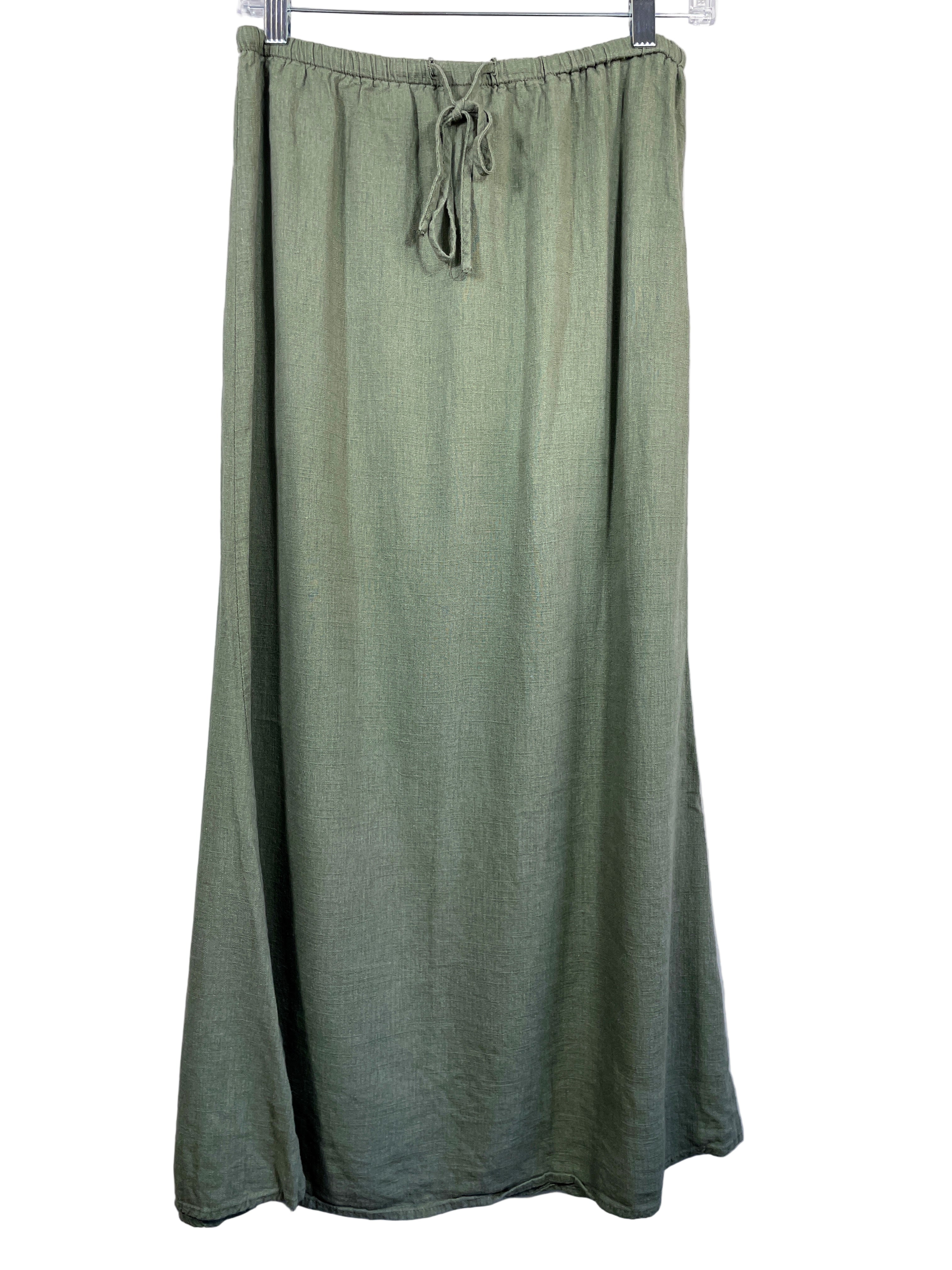 Front view of long green SHEIN skirt with elastic drawstring waistband hanging on hanger.