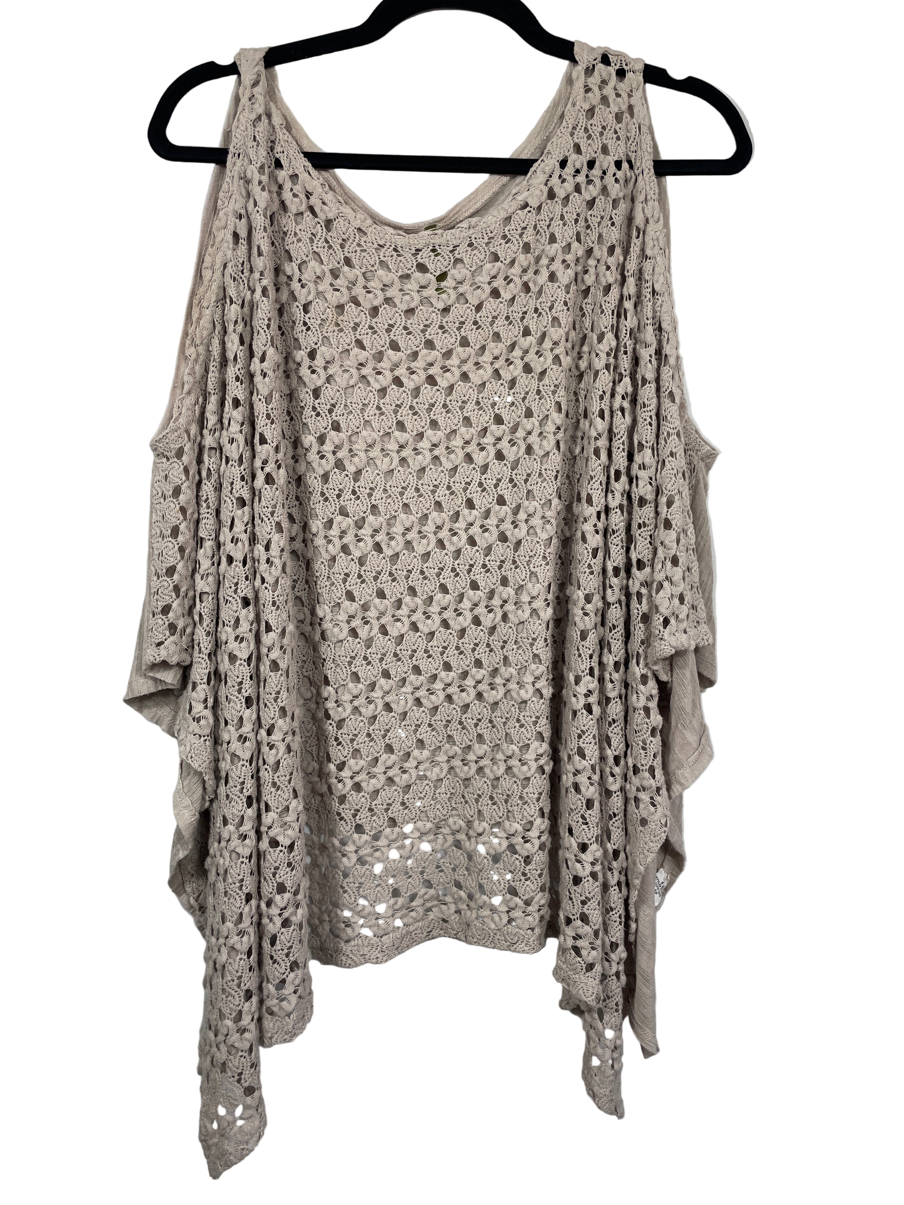 Front view showing crochet overlay and open shoulder design of taupe West Kei poncho top