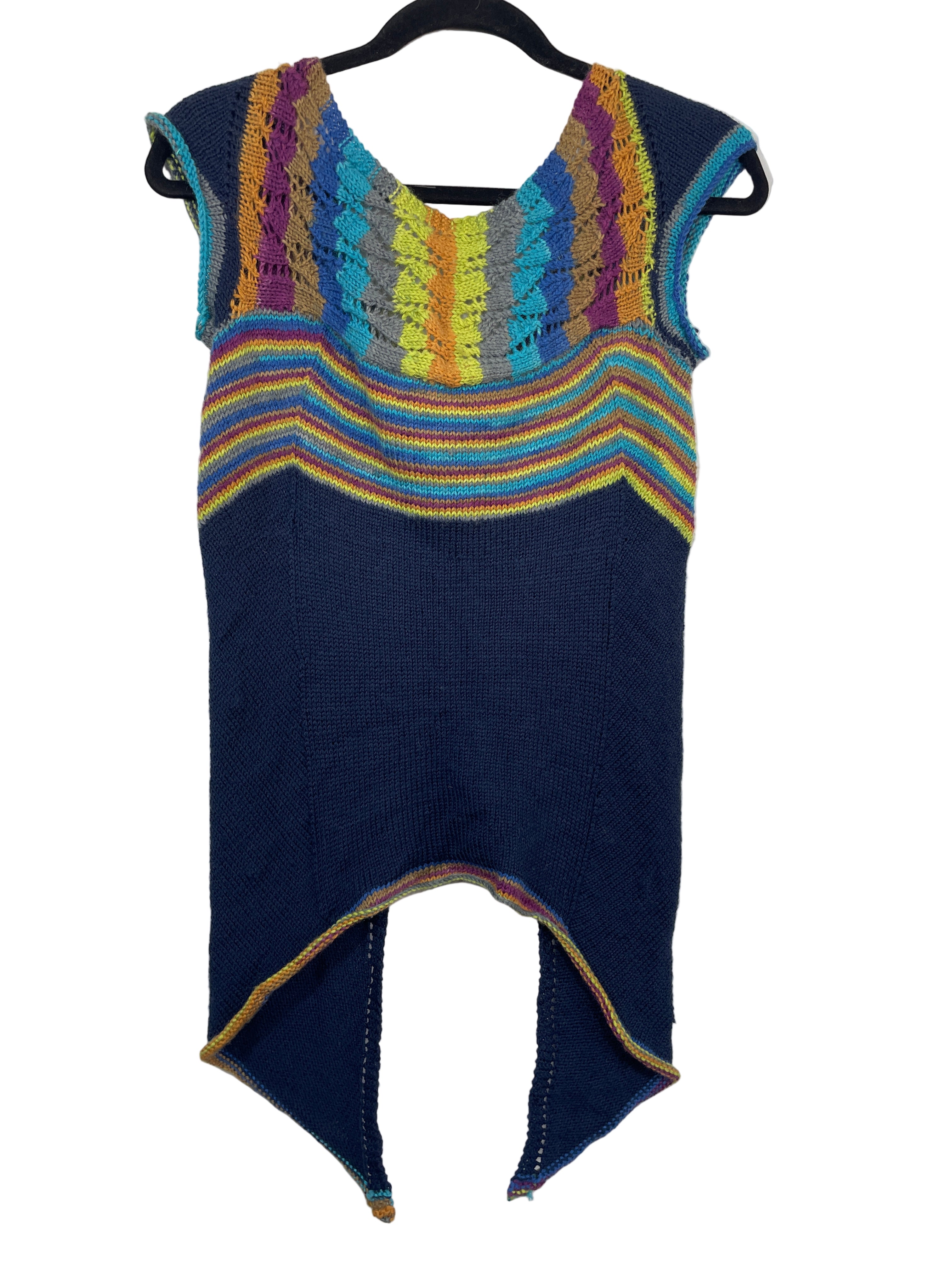 Back view of handmade multicolour knit vest with scalloped knit pattern and asymmetrical hem.
