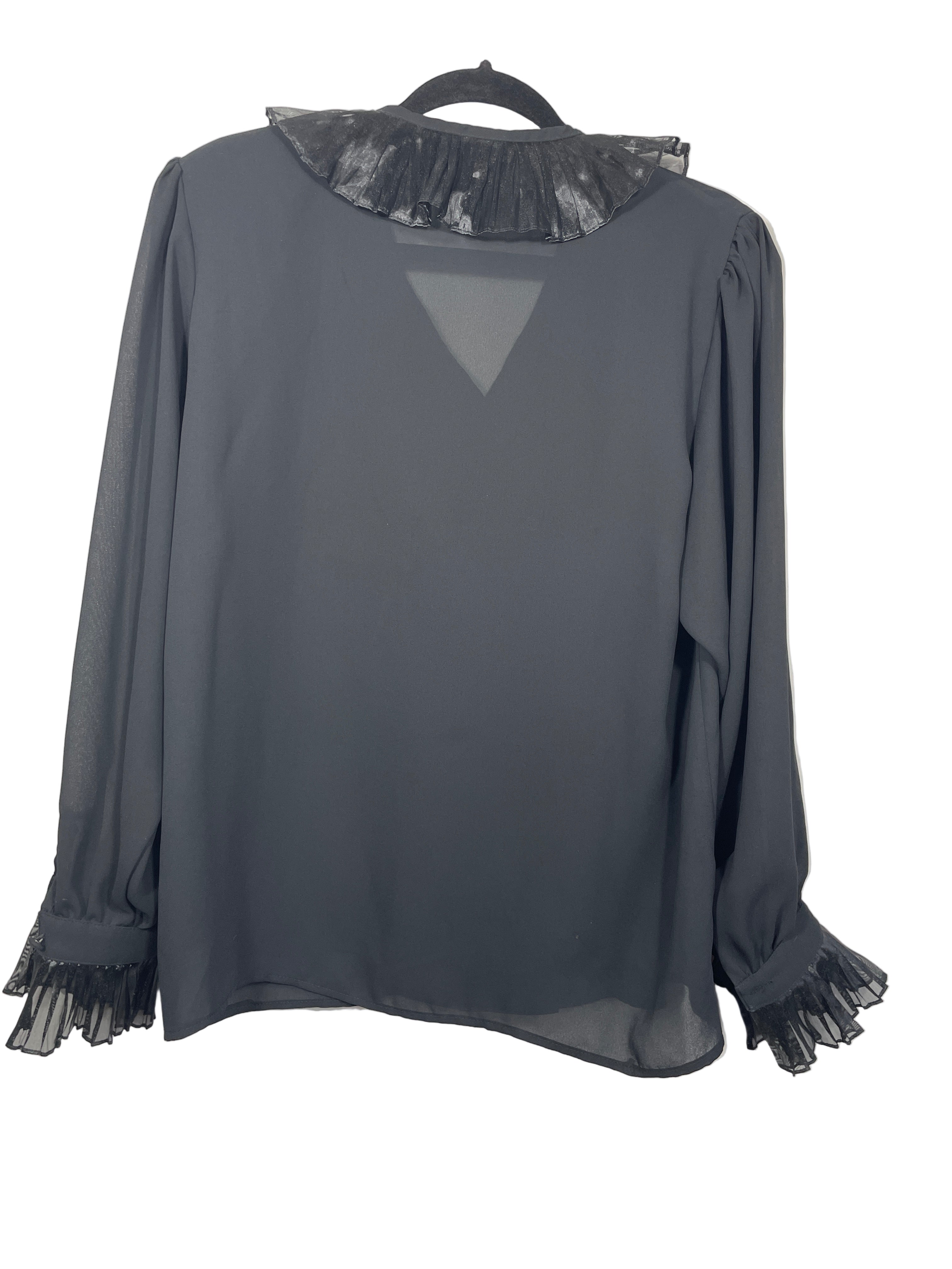 Marcella black blouse back view showing sheer lightweight fabric and structured shoulder design
