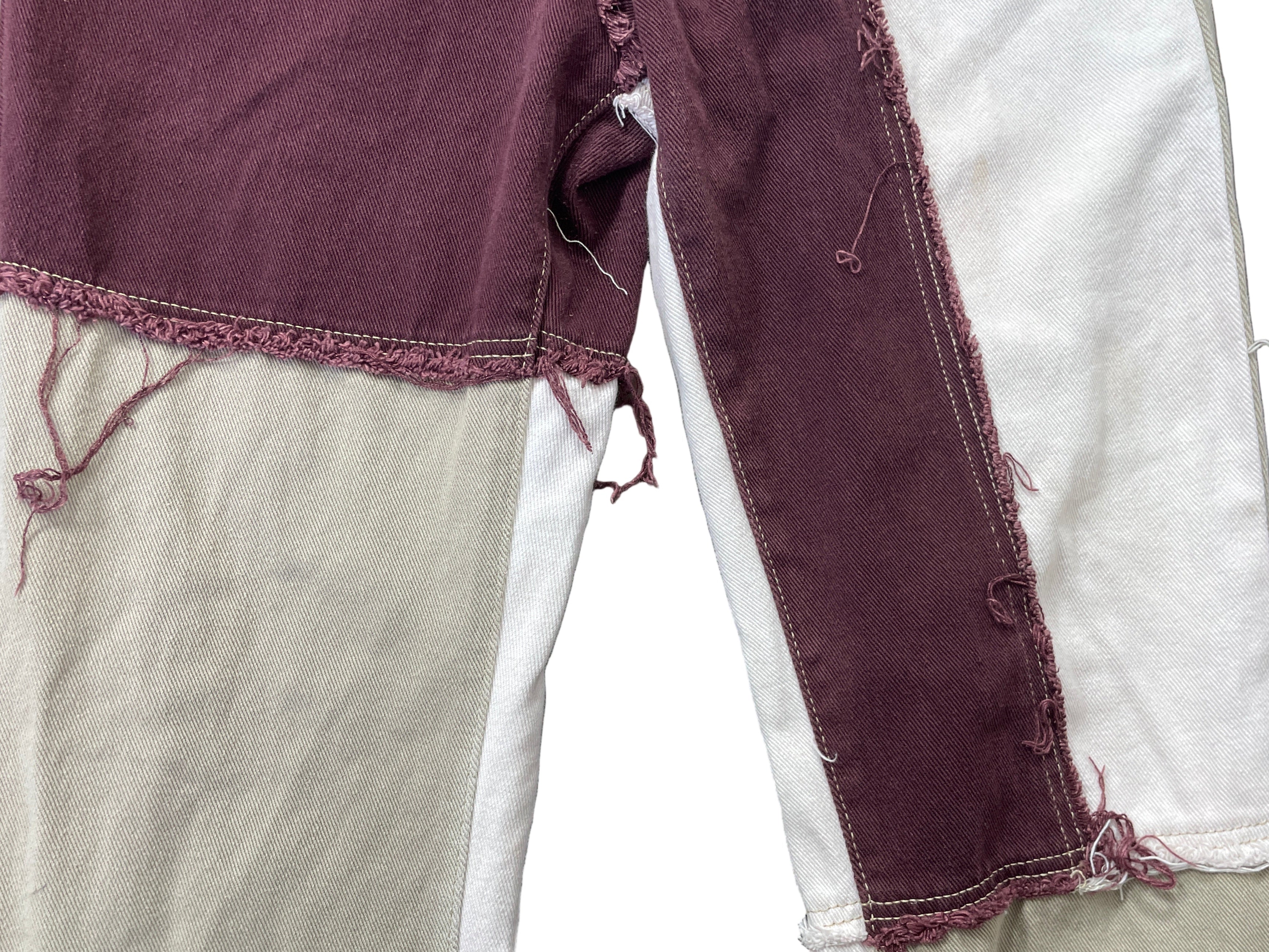 Lower leg close-up showing stitching details and mixed fabric tones
