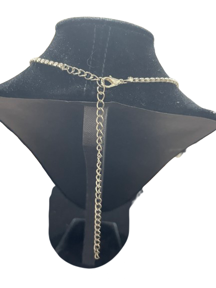 Back view showing adjustable chain and clasp on silver rhinestone necklace
