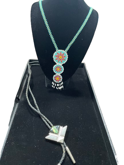 Beaded turquoise and red necklace and silver bolo tie set front view
