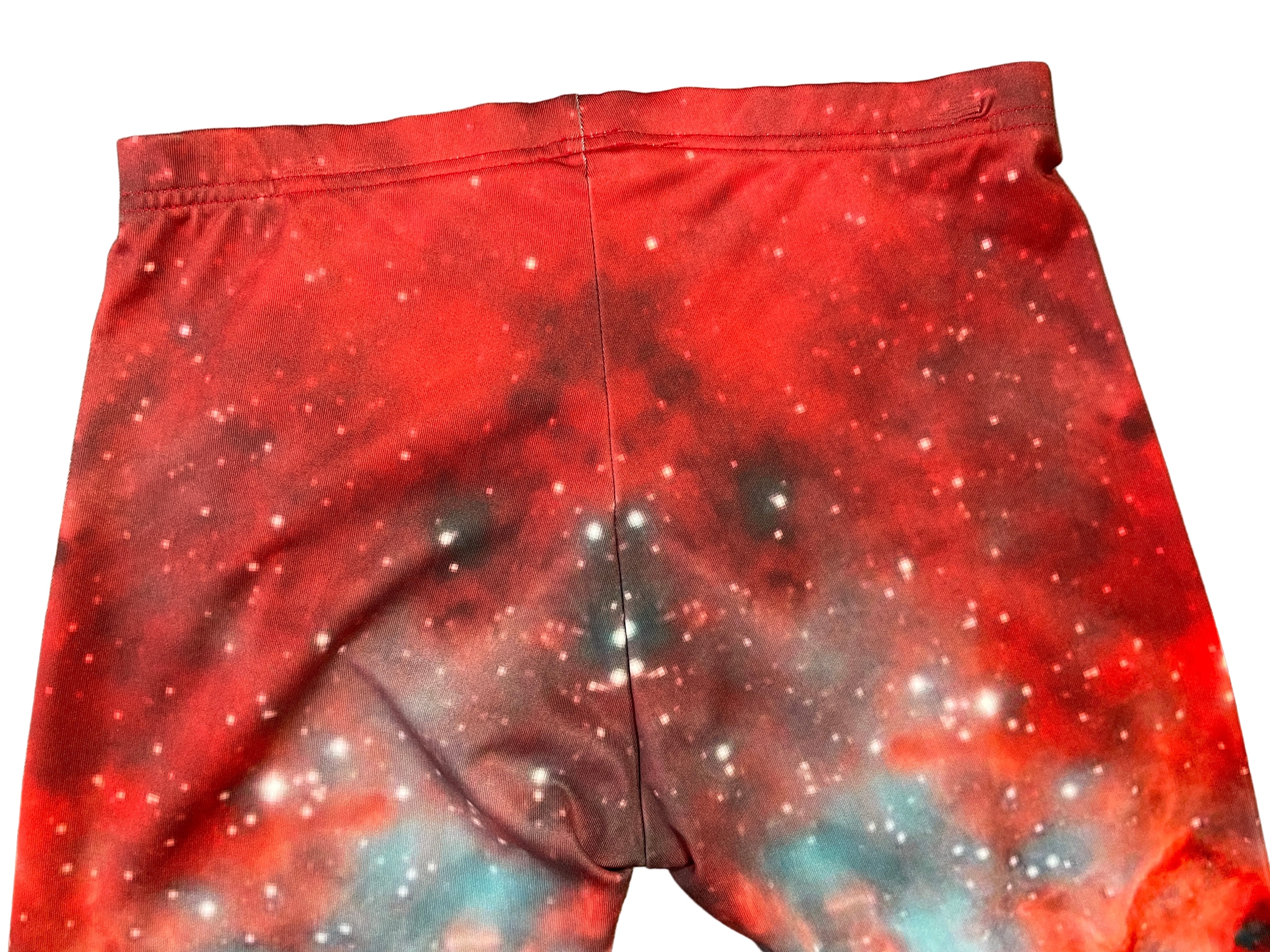 Back view of leggings with elastic waistband and galaxy pattern
