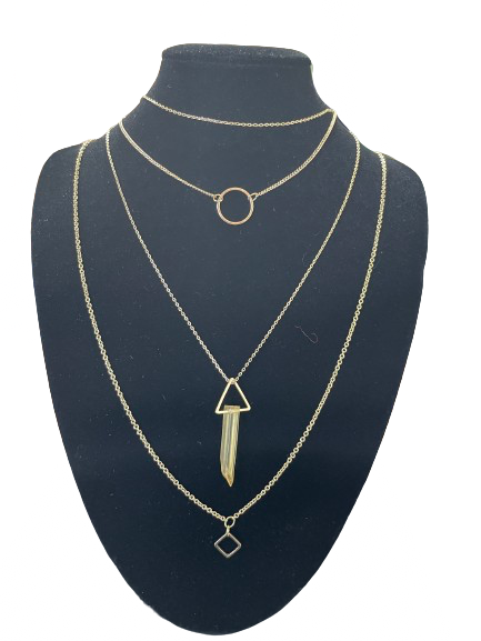 Layered gold tone geometric necklace with crystal point pendant displayed on black bust