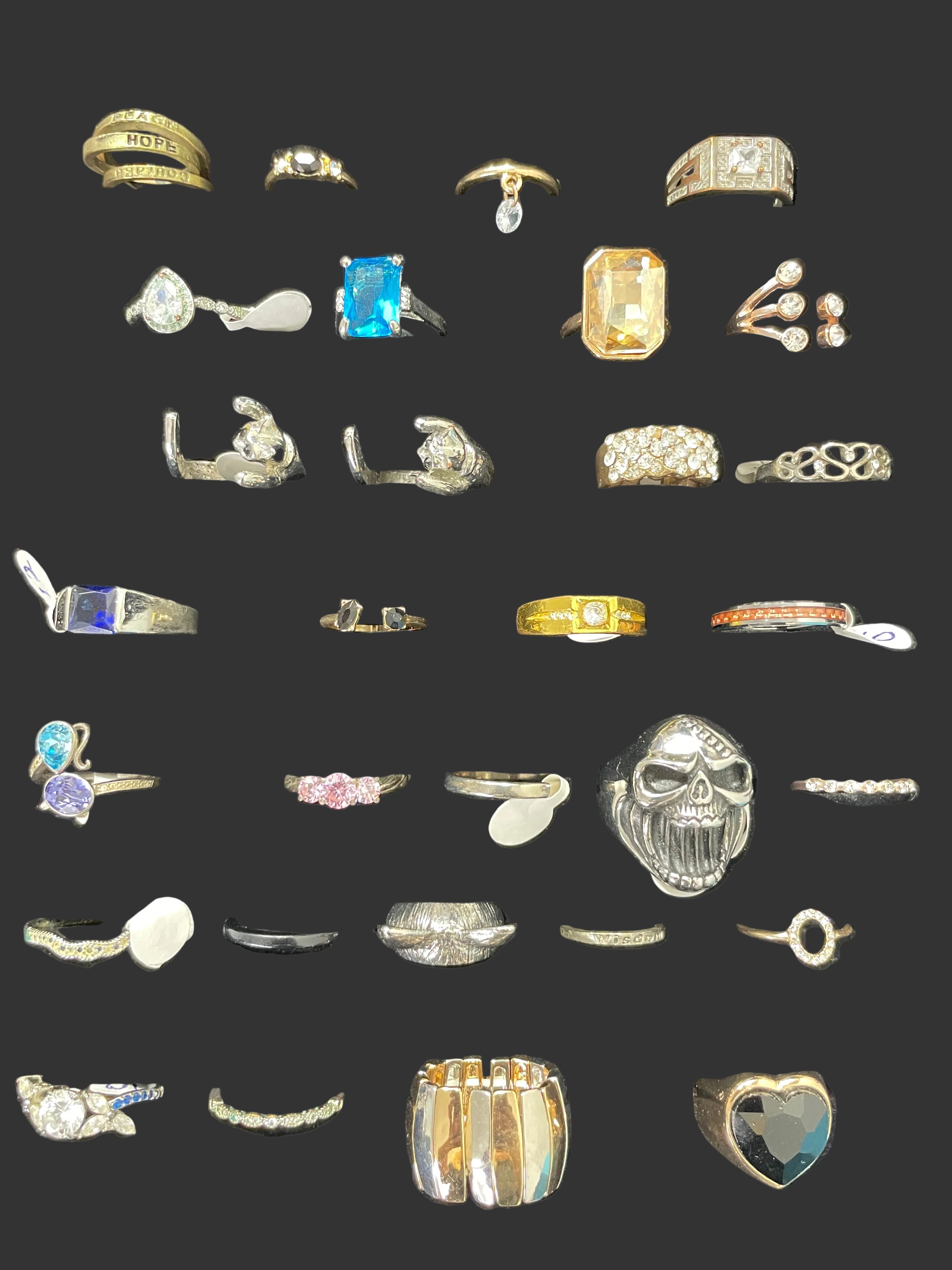 display of 30 costume jewellery rings