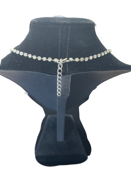 Back view of vintage rhinestone collar necklace showing extender chain