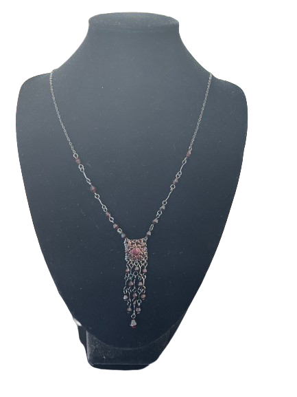 necklace with burgundy rhinestone centre drop and beaded fringe on black display bust