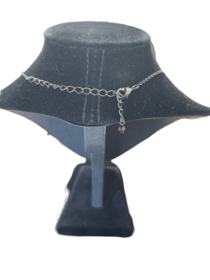 Back view of necklace showing extender chain and burgundy bead accent