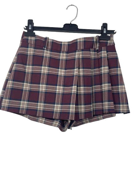 Front view of Zara burgundy plaid skort with side pleats.