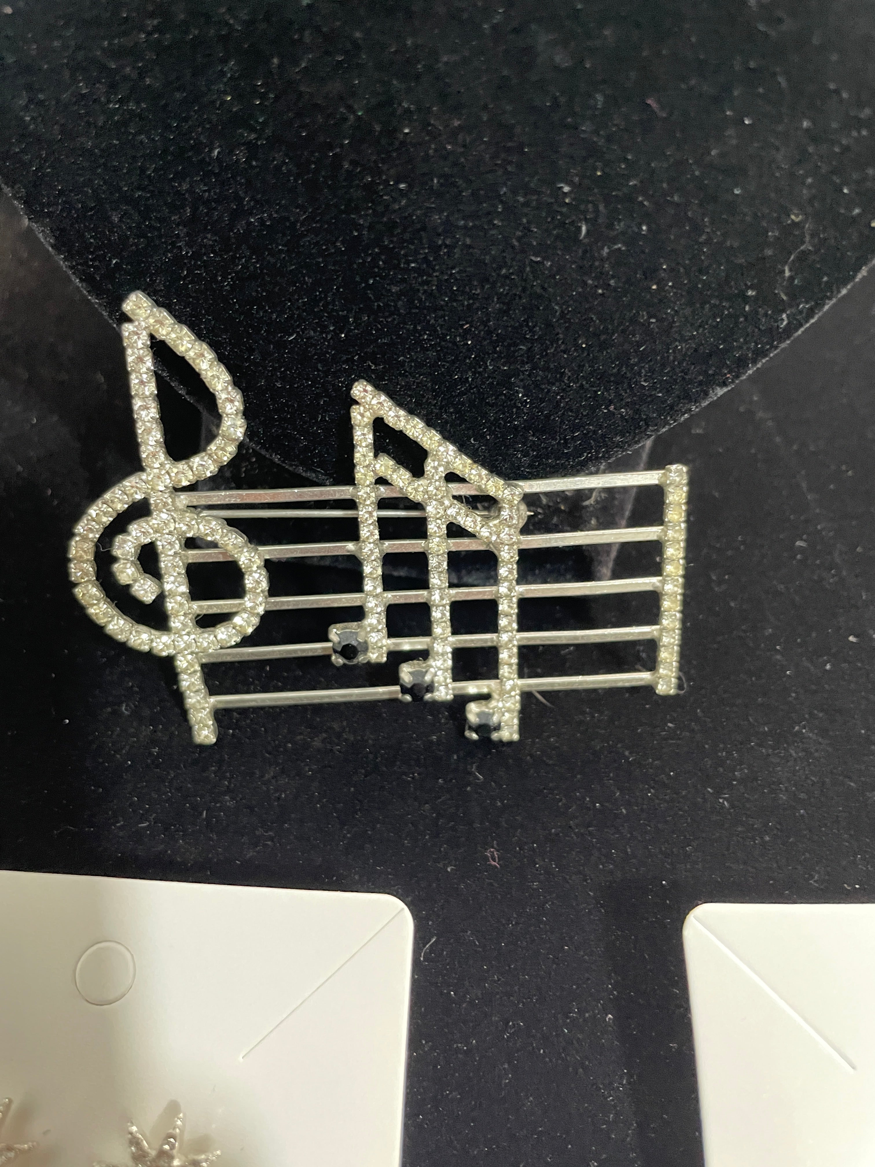 Vintage late 1980s silver tone rhinestone musical notes and staff brooch