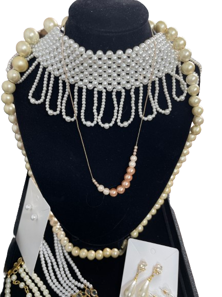 White faux pearl statement choker necklace with looped pearl fringe and assorted pearl necklaces