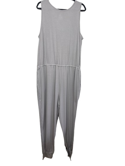 A light gray sleeveless jumpsuit hanging on a black hanger against a plain white background.