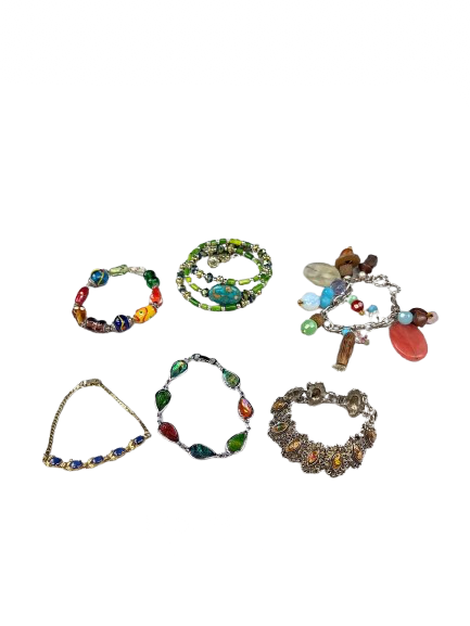 Lot of six assorted bracelets in mixed materials and styles