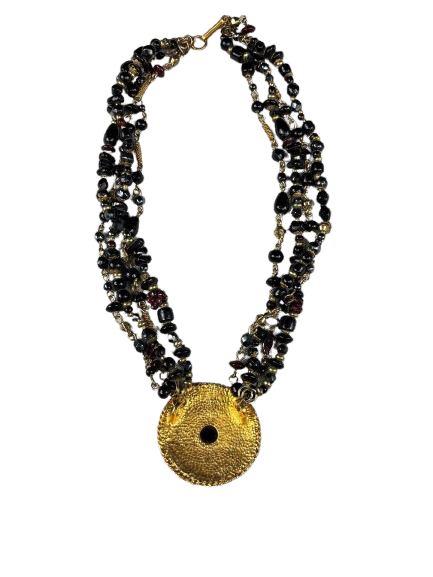Back view of vintage multi-strand necklace with gold tone pendant