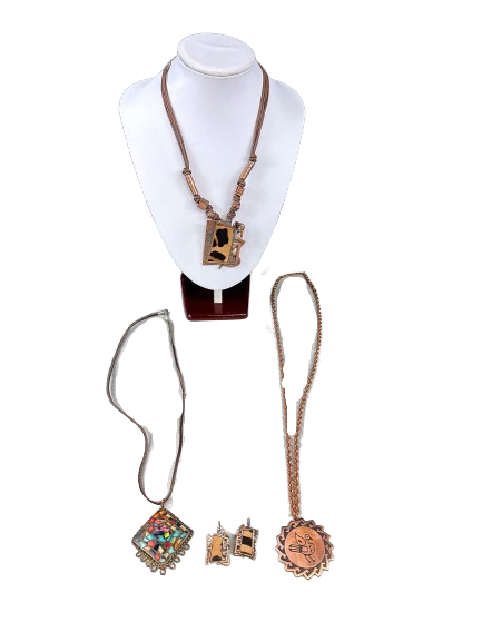 Vintage 4-piece copper jewellery lot with necklace, earrings, and pendants