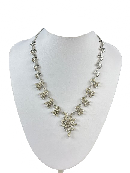 Silver-tone floral rhinestone necklace with drop pendant