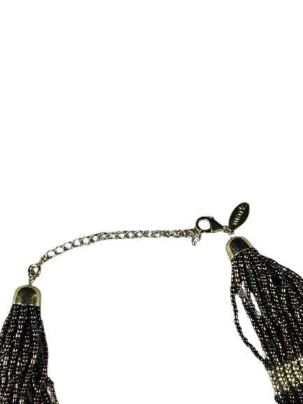 Close-up of Mark by Avon signed clasp